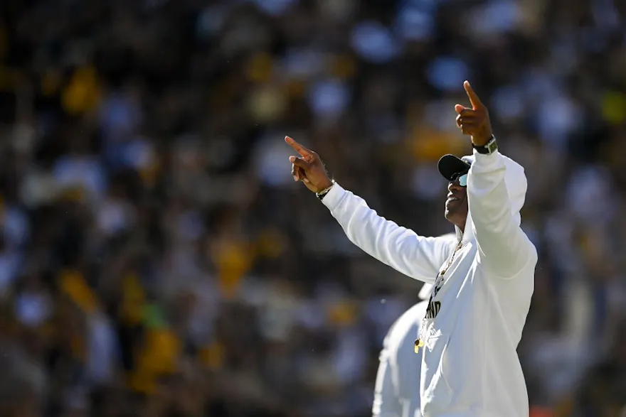 Head coach Deion Sanders of the Colorado Buffaloes points to the crowd as we look at our best college football Week 2 predictions