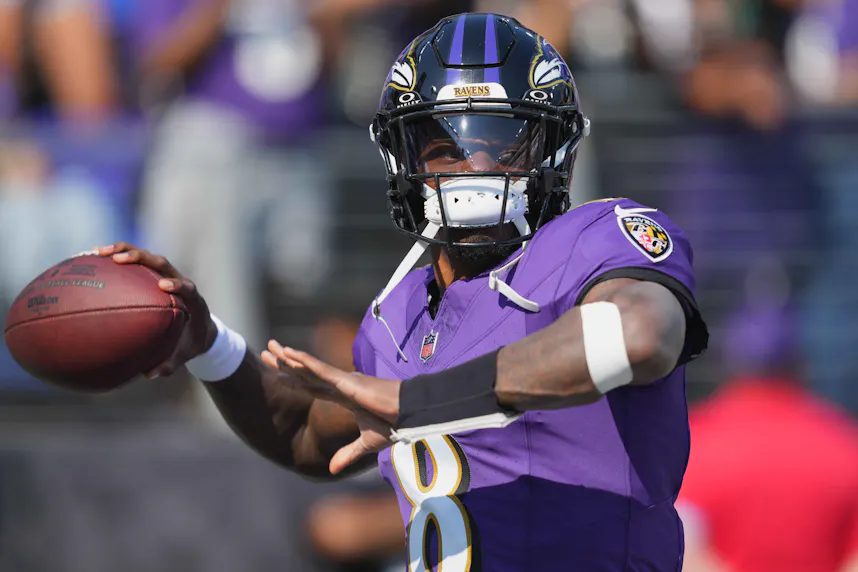 Baltimore Ravens quarterback Lamar Jackson warms up prior to the game against the Washington Commanders as we look at our Ravens vs. Buccaneers early picks.