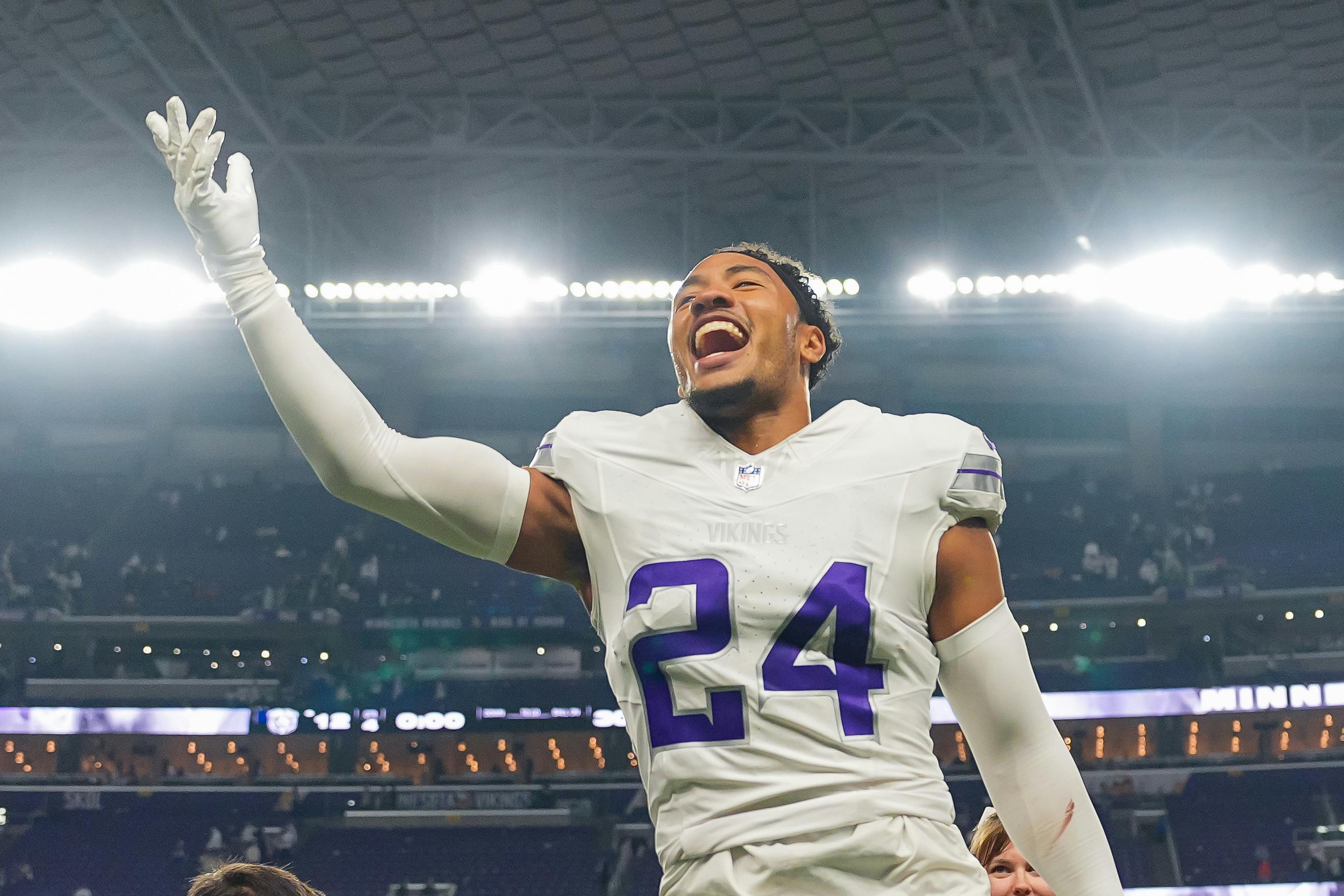 Minnesota Vikings safety Camryn Bynum celebrates after the game against the Chicago Bears as we analyze the 2025 Super Bowl odds. 