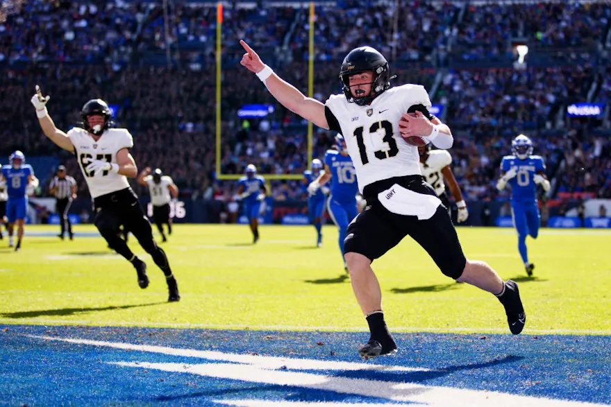 Quarterback Bryson Daily #13 of the Army Black Knights celebrates as he scores and we make our best Army vs. Navy prediction