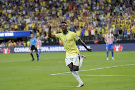 Brazil forward Vinicius Junior reacts after scoring a goal against Paraguay during the first half at Allegiant Stadium as we profile the best bets for Brazil vs. Colombia. 