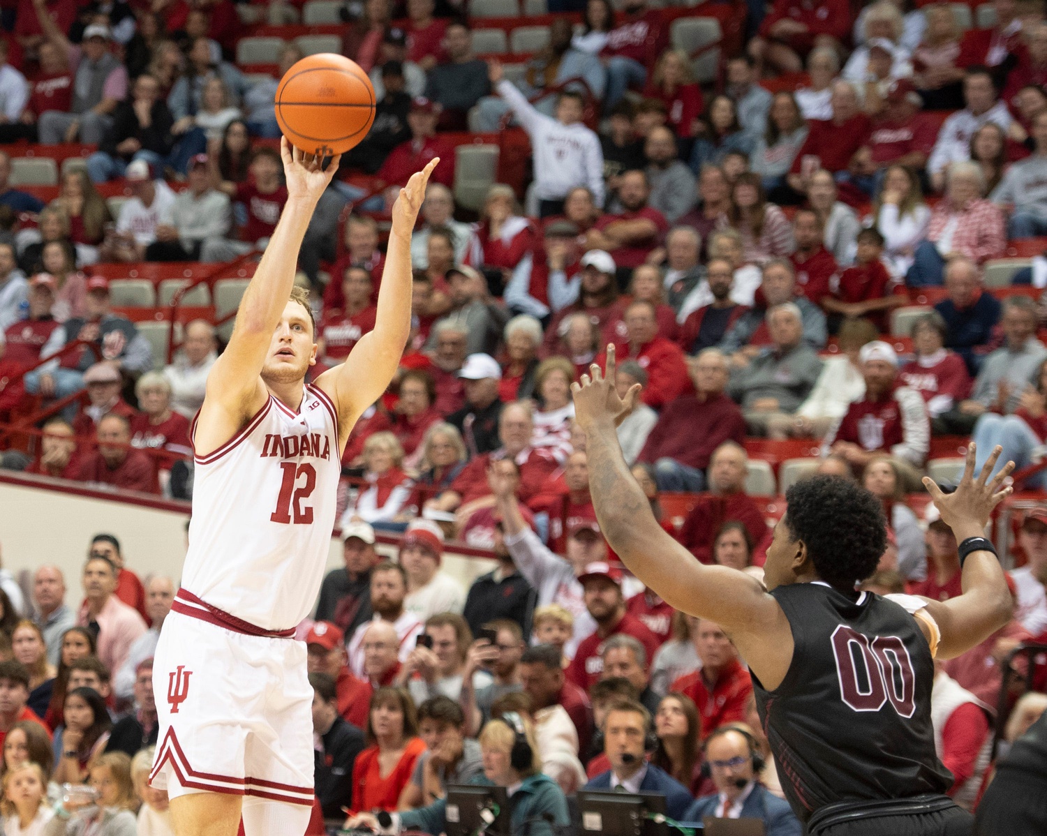  Indiana's Tucker DeVries shoots a long-range jumper as we offer our Milwaukee vs. Indiana prediction