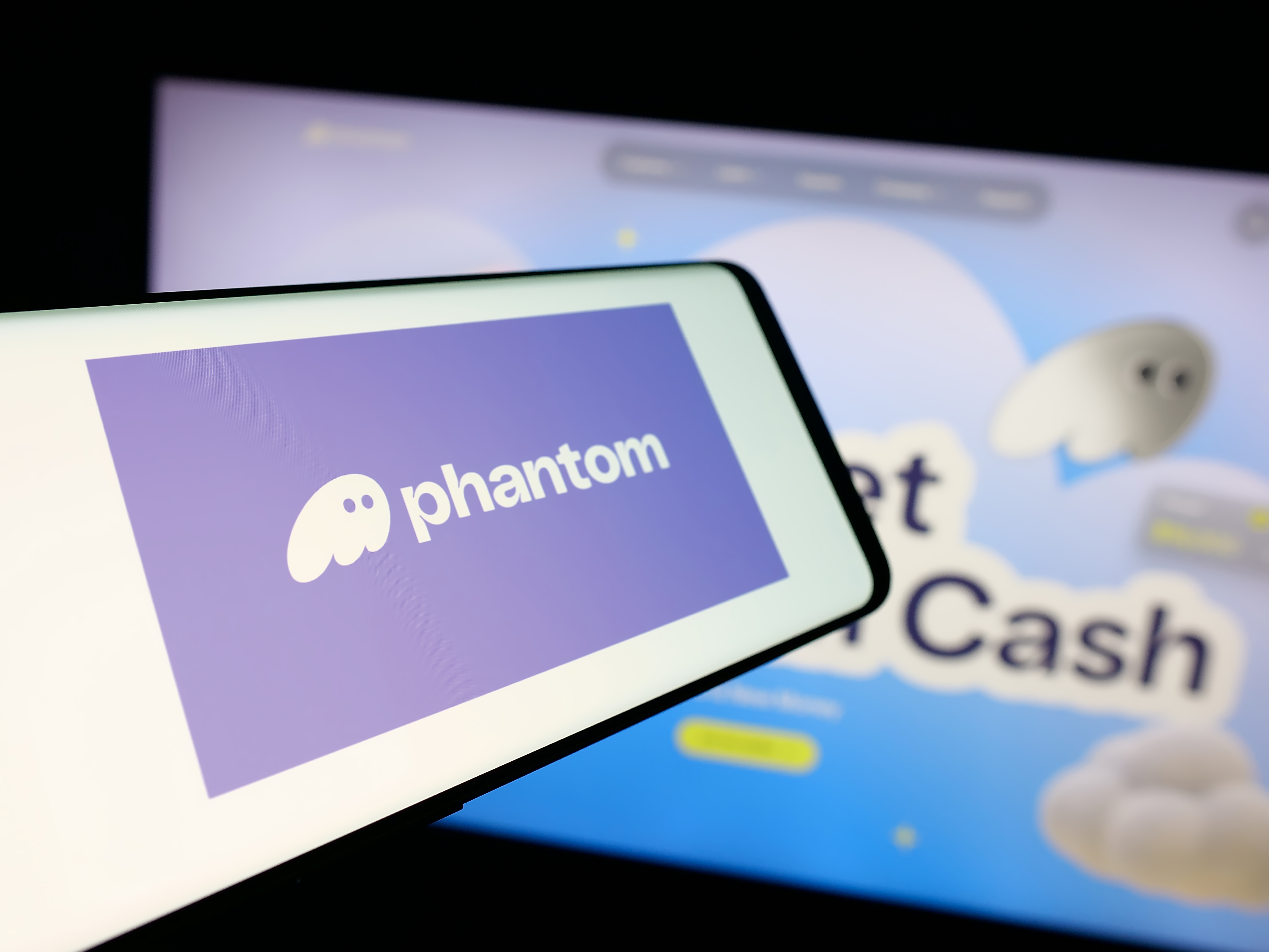 The logo of crypto app company Phantom Technologies Inc. is seen on screen as we look at its launch of prediction markets