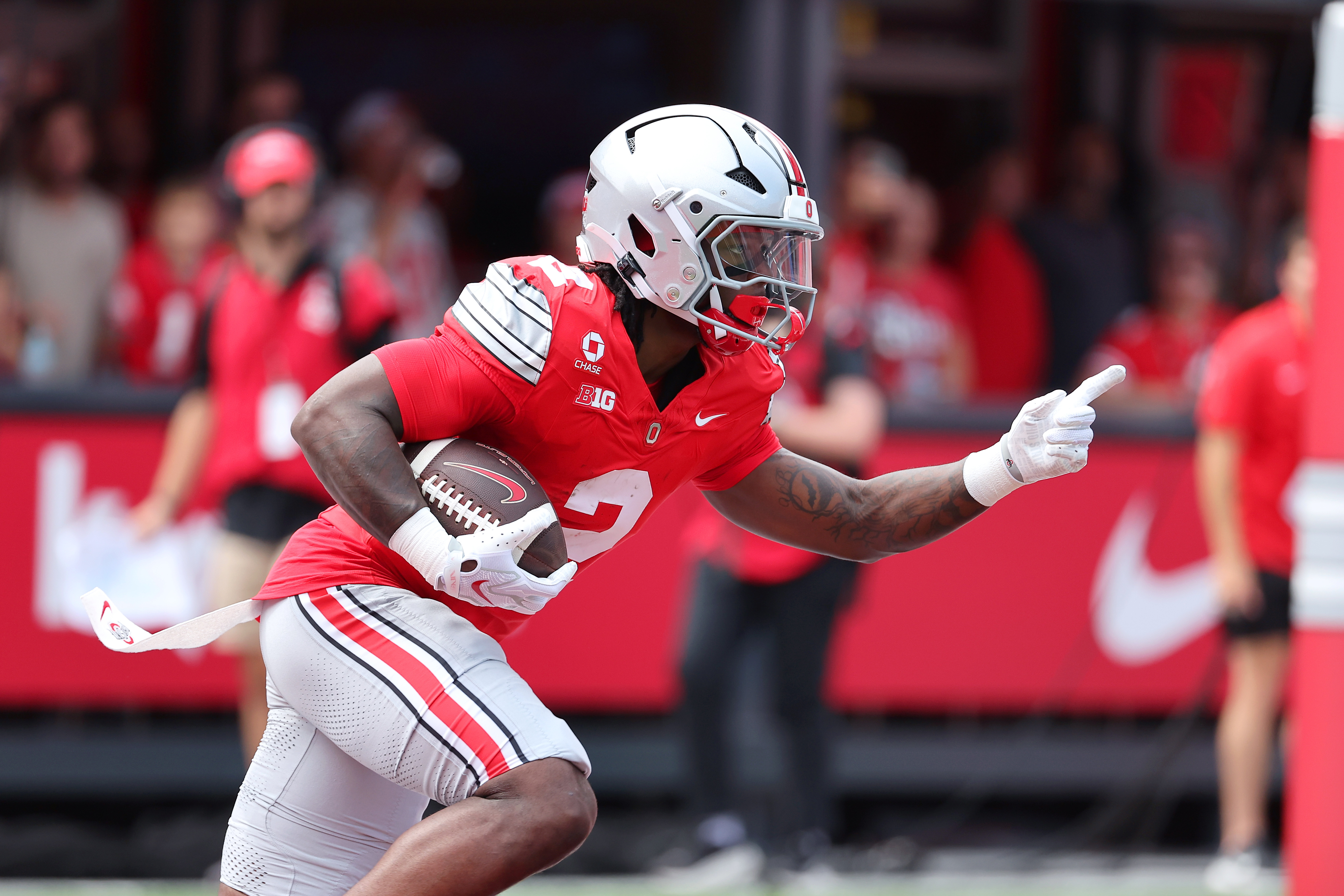 Ohio State running back Legend Bey (2) carries the ball as we break down our Kent State vs. Ohio State prediction.