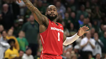 Jamal Shead #1 of the Houston Cougars attempts a three point basket as we look at the latest 2024 March Madness title odds.