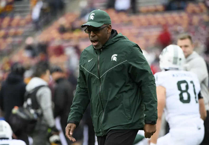  Interim head coach Harlon Barnett of the Michigan State Spartans as we look at Michigan's mobile sports betting figures from October 2023.