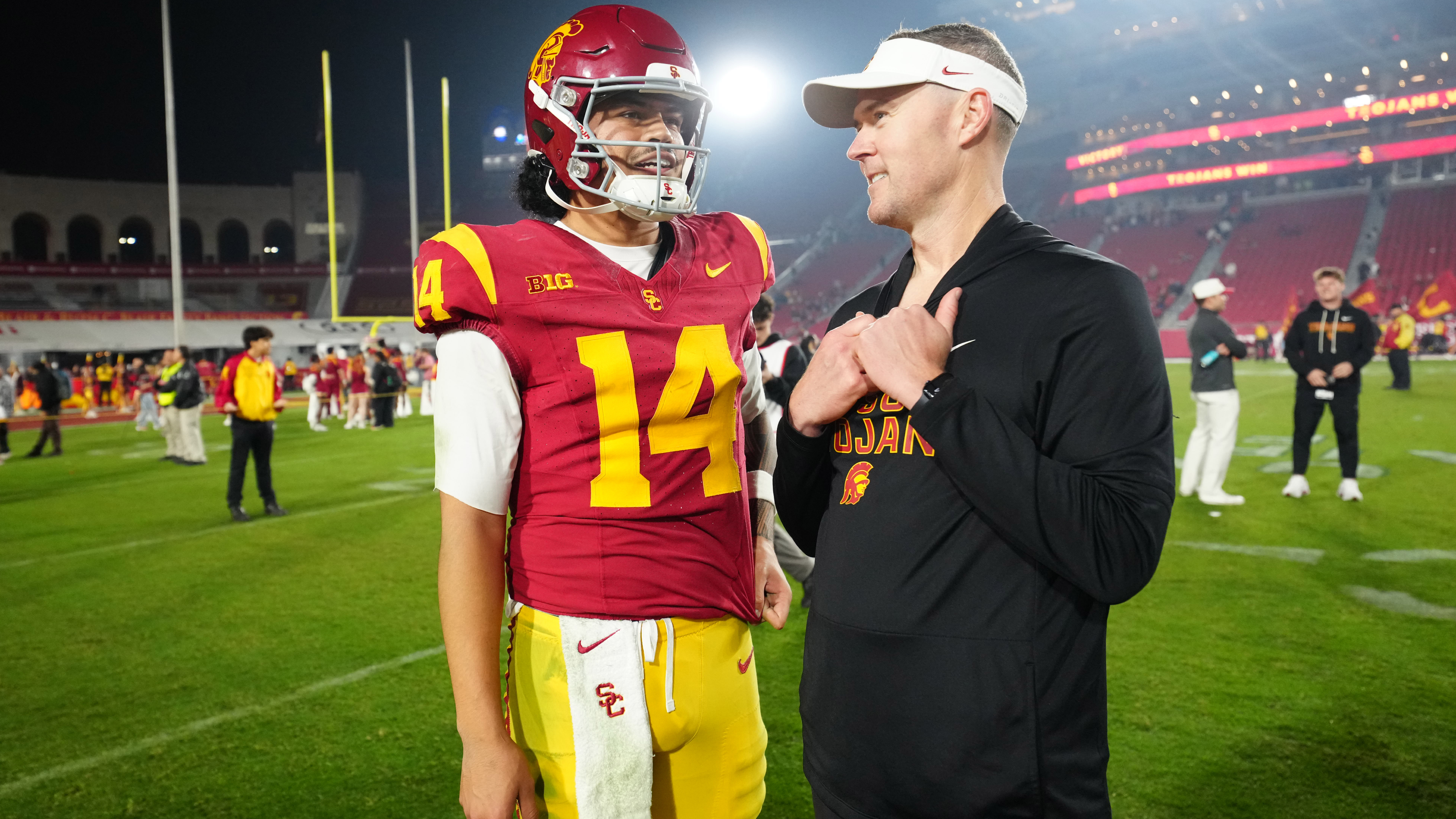Southern California Trojans quarterback Jayden Maiava and head coach Lincoln Riley react as we make our college football picks against the spread for Week 0. 