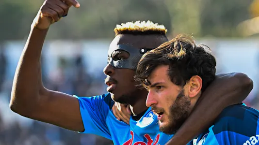 Napoli's Nigerian forward Victor Osimhen celebrates with Napoli's Georgian forward Khvicha Kvaratskhelia. We're backing Napoli in our soccer best bets for February 10-13.