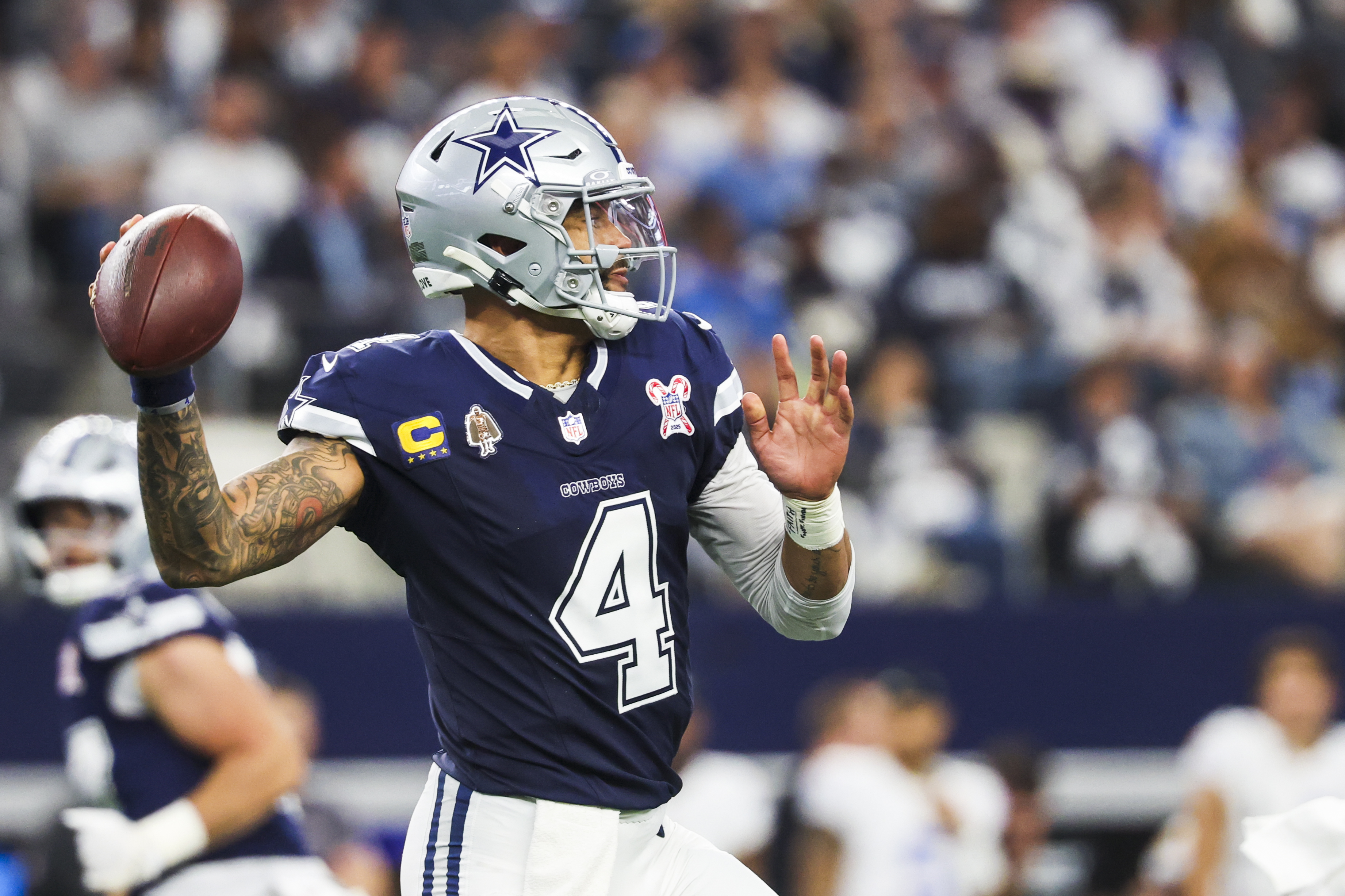 Dallas Cowboys quarterback Dak Prescott (4) throws the ball as we offer our Cowboys vs. Commanders predictions.