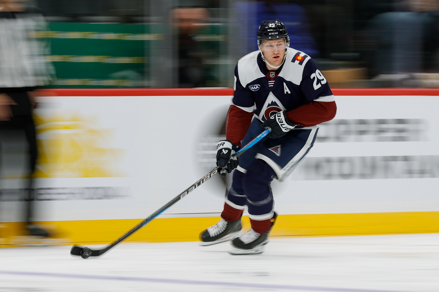 Nathan MacKinnon controls the puck as we offer our NHL player props today. 