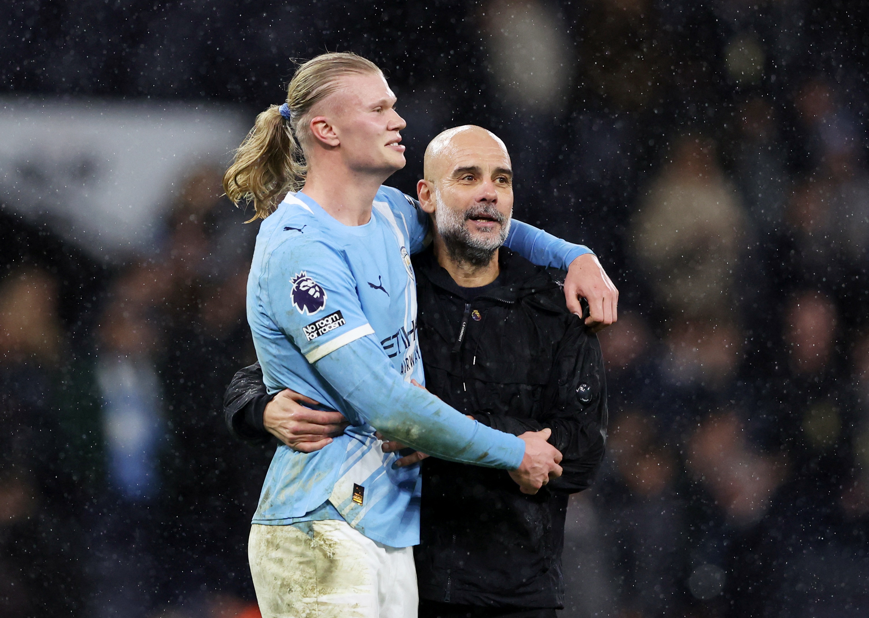 Erling Haaland and Pep Guardiola embrace as we provide our Real Madrid vs. Man City prediction and odds.