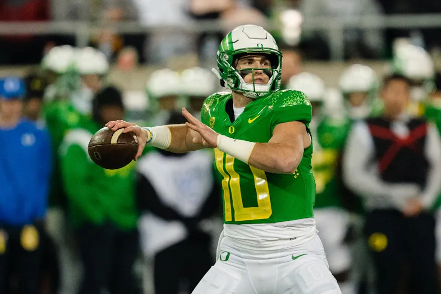 Quarterback Bo Nix of the Oregon Ducks prepares to throw a pass against the Utah Utes at Autzen Stadium on Nov. 19, 2022 in Eugene, Oregon.