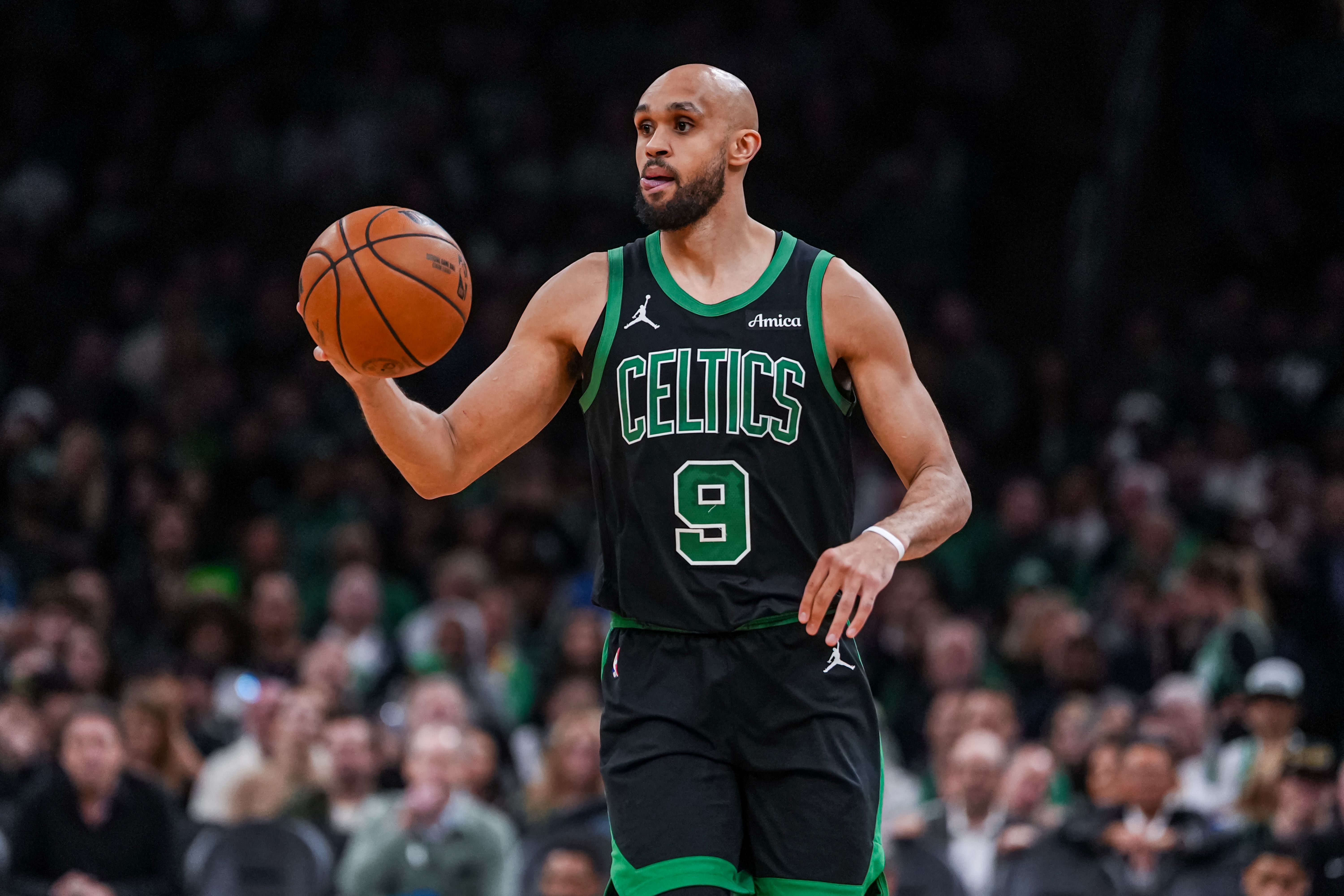 Boston Celtics guard Derrick White dribbles, and he's key as we look at our 76ers vs. Celtics prediction.