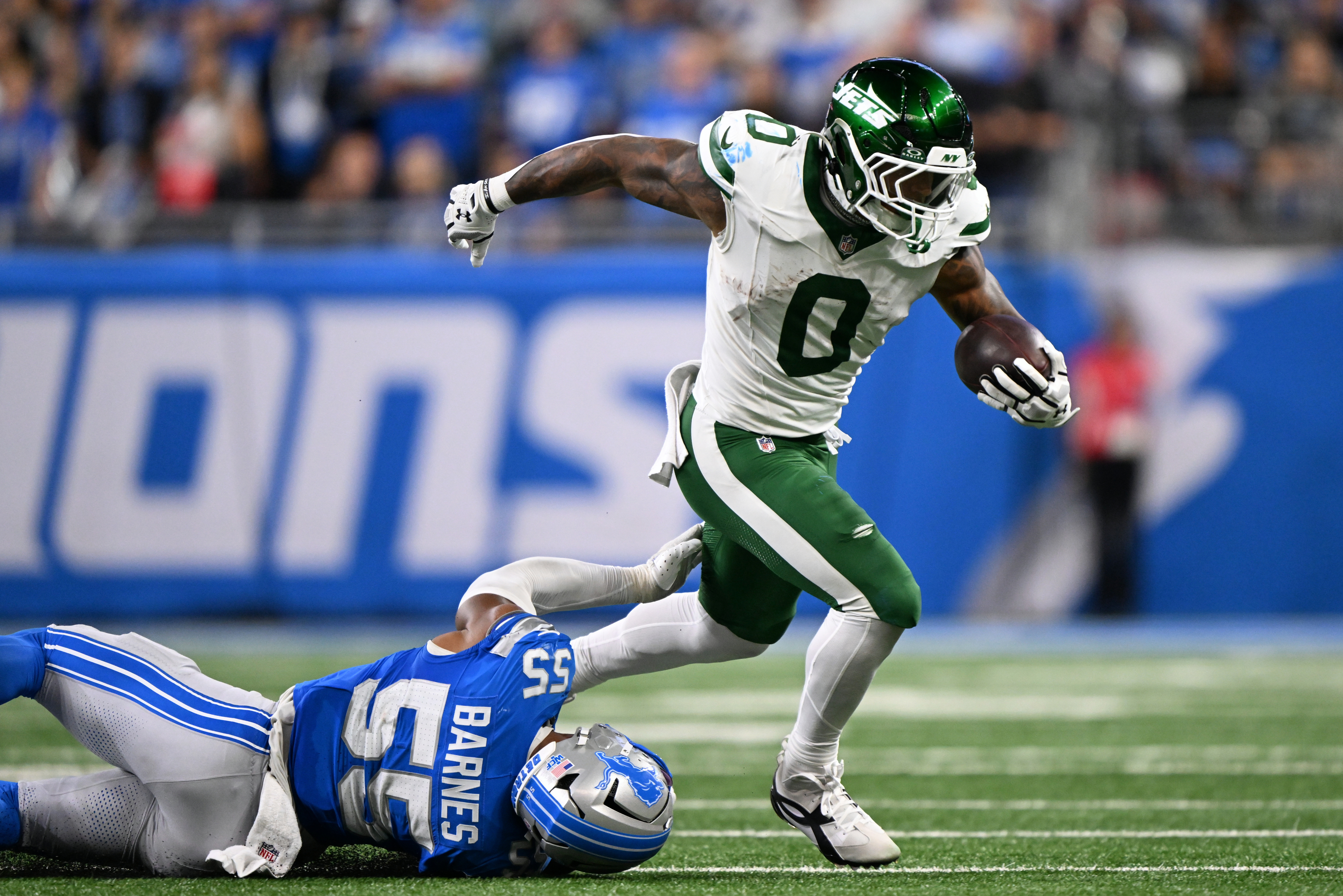 New York Jets running back Braelon Allen (0) leaps as he is featured in our NFL anytime touchdown scorer predictions.