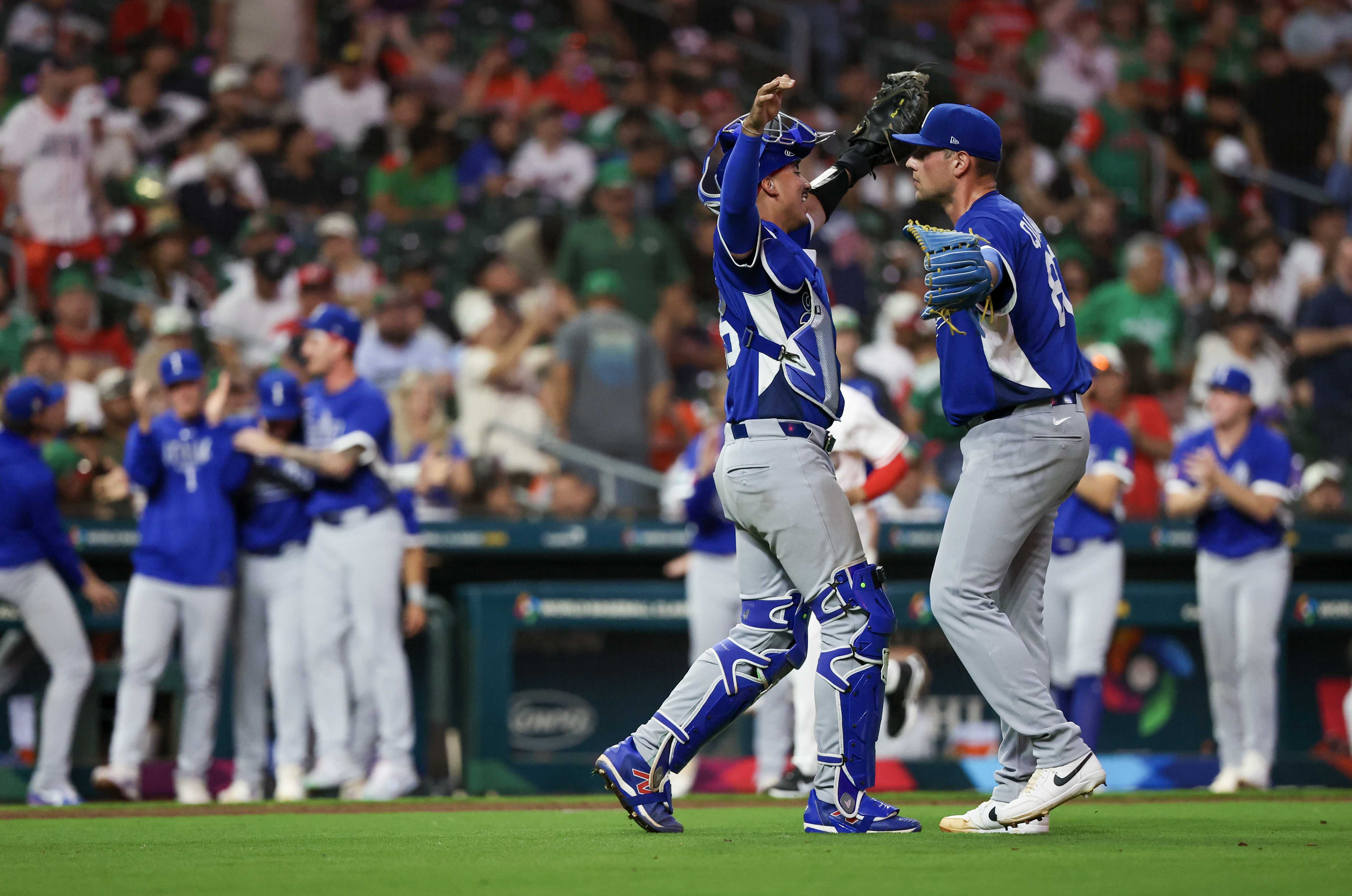 Italy pitcher Gabriele Quattrini hugs catcher J.J. D'Orazio ahead of the quarterfinals, as the Italians represent my favorite WBC long-shot contender for the knockout stage.