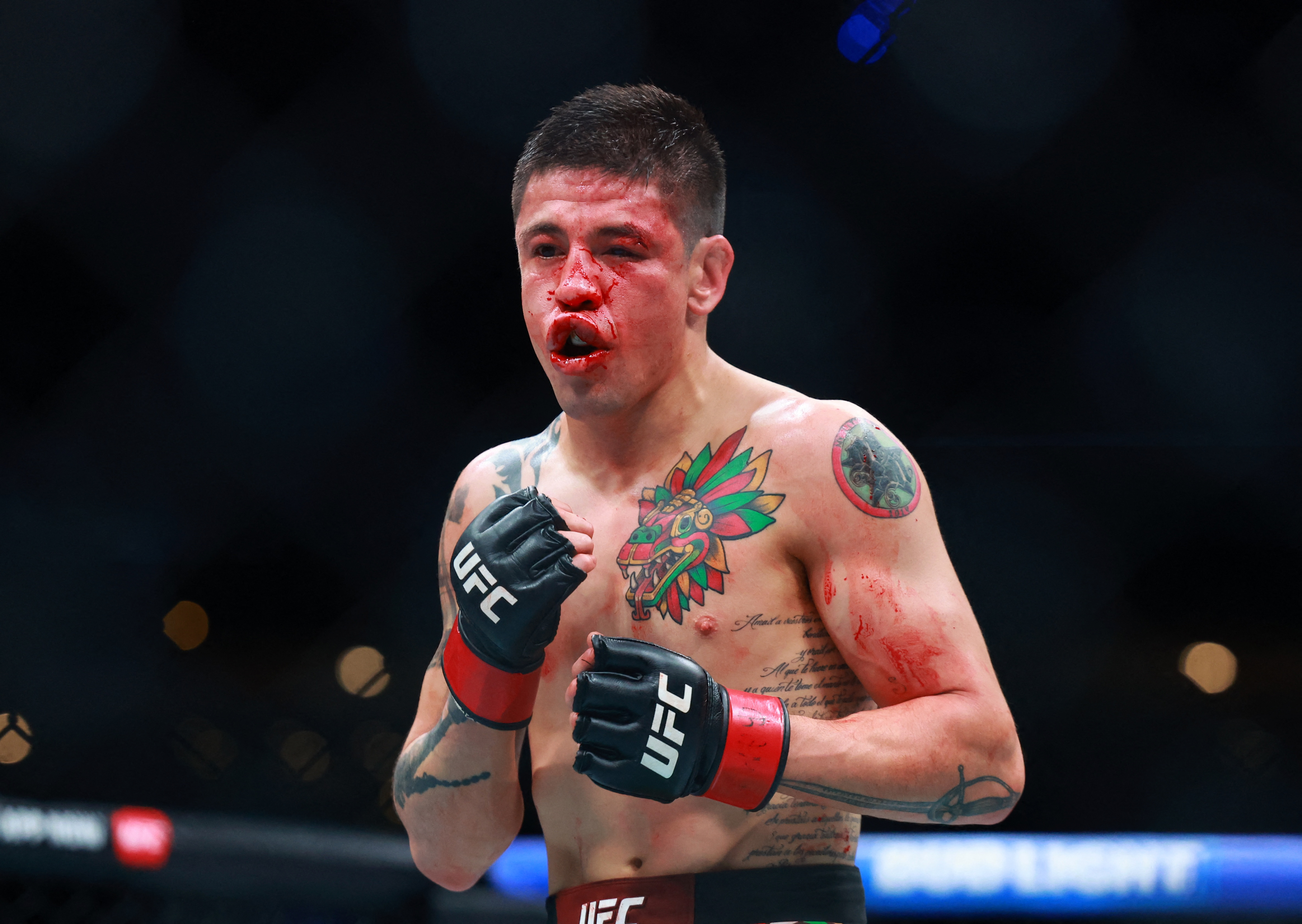 Brandon Moreno during a fight as we make our best Moreno vs. Morales prediction.