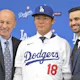 Yoshinobu Yamamoto of the Los Angeles Dodgers poses for a photo during an introductory press conference, and we offer our top Rookie of the Year odds based on the best MLB odds.