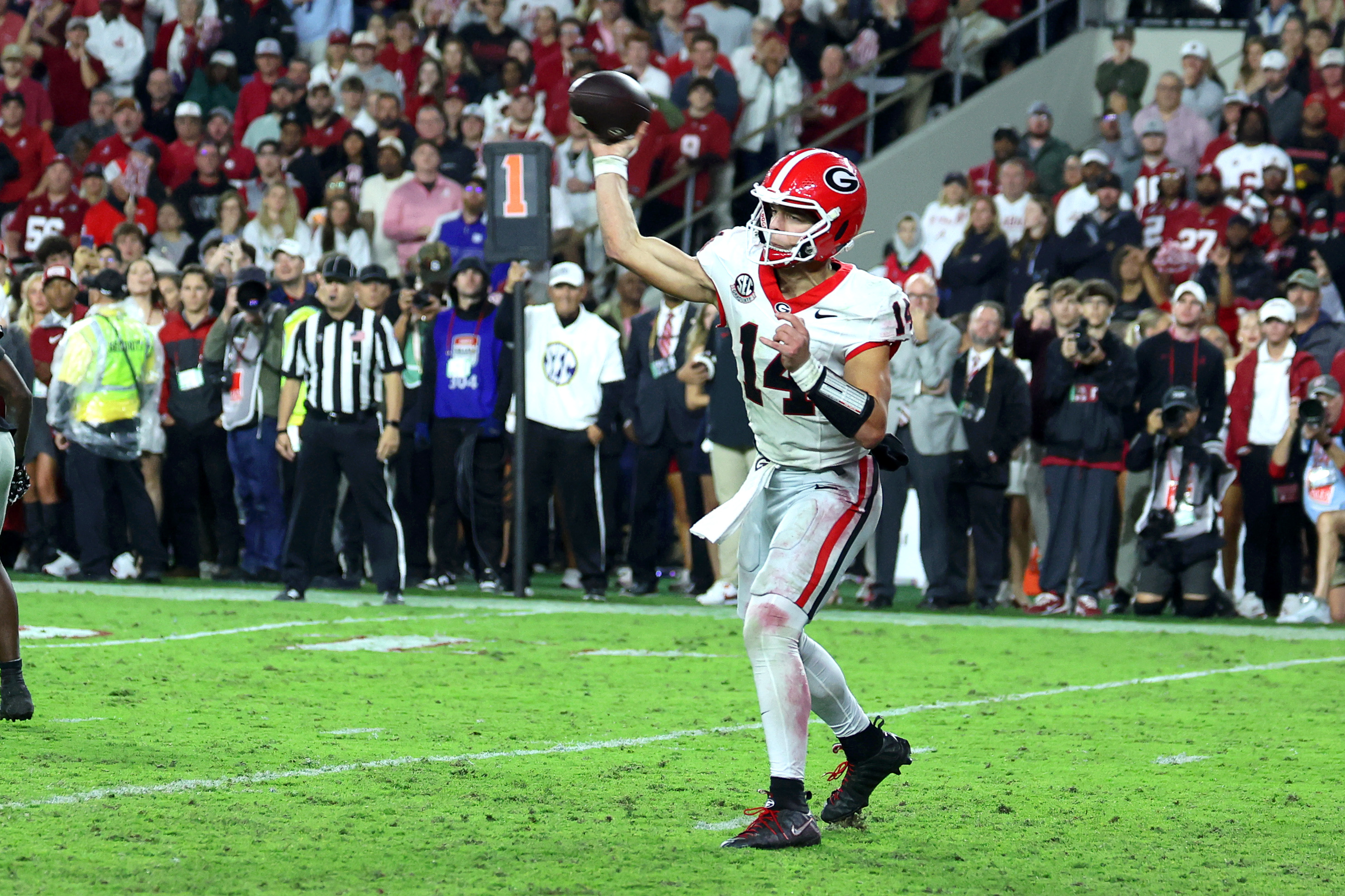 Georgia Bulldogs quarterback Gunner Stockton (14) passes the ball as we look at the 2026 College Football playoff odds.