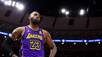 LeBron James #23 of the Los Angeles Lakers looks on as we make our predictios for how James will score his 40,000th career point in the NBA.