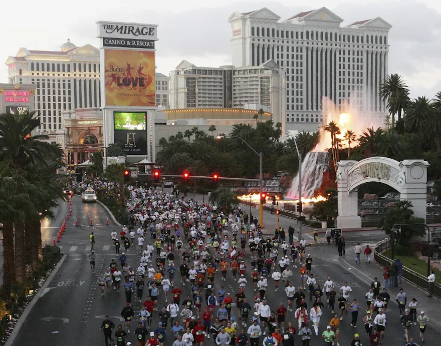Participants in the second annual New Las Vegas Marathon run past the volcano attraction at the Mirage Hotel & Casino as we look at the plans to renovate and rebrand the Las Vegas icon