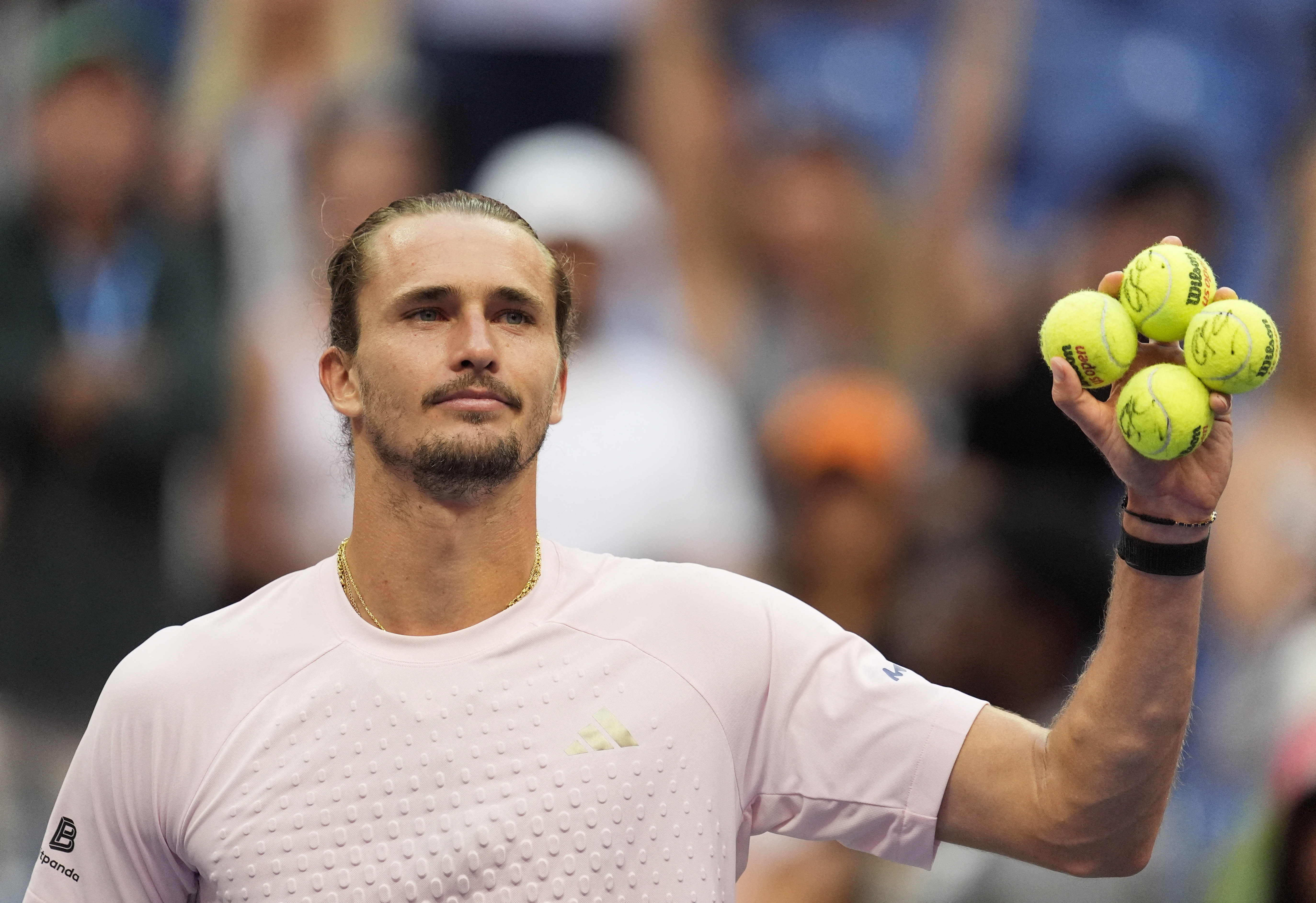 Germany's Alexander Zverev holds up autographed tennis balls as he is featured in our US Open Men's final predictions.