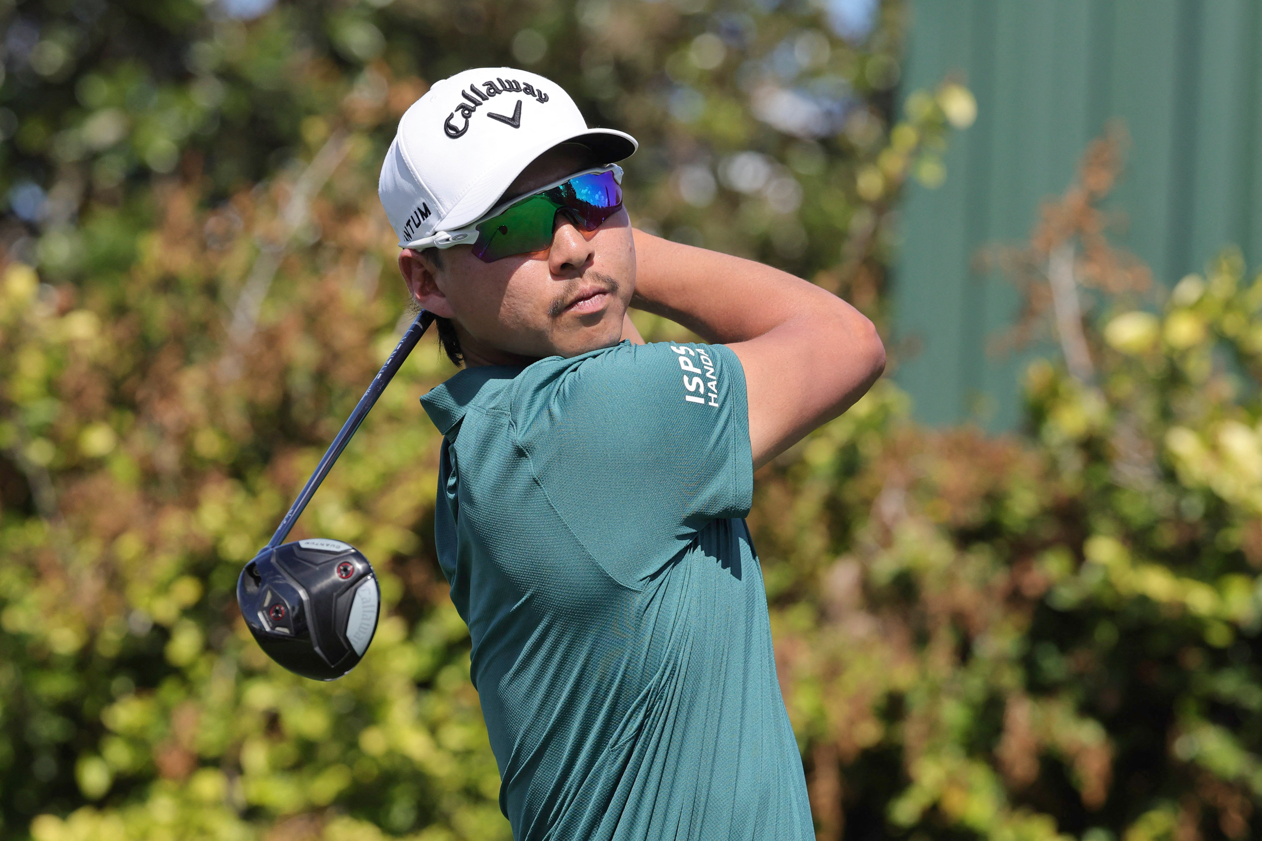  Min Woo lee plays his shot from the ninth tee as he is featured in our Houston Open Round 2 picks & predictions.