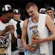 Nikola Jokic of the Denver Nuggets celebrates with teammates as we look at the NBA Finals odds