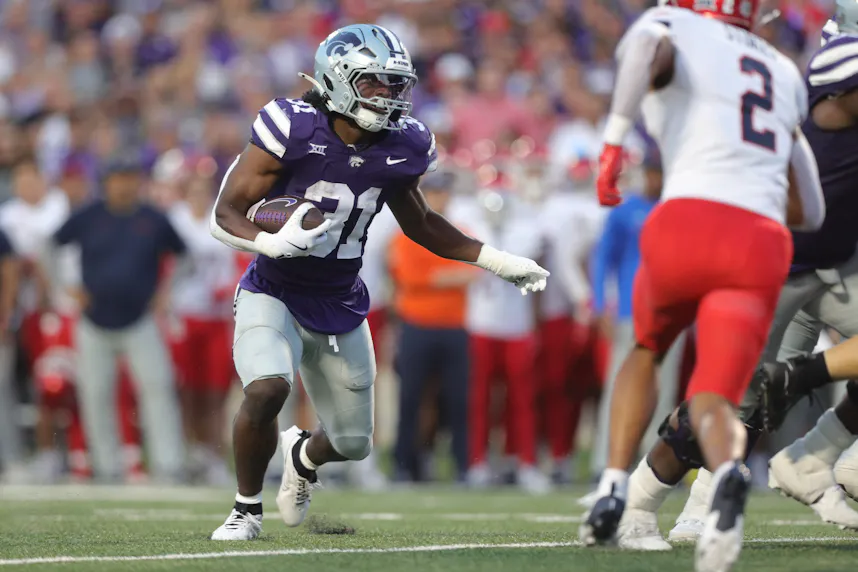 Kansas State Wildcats running back DJ Giddens runs the ball against Arizona as we offer our best Kansas State vs. BYU prediction.