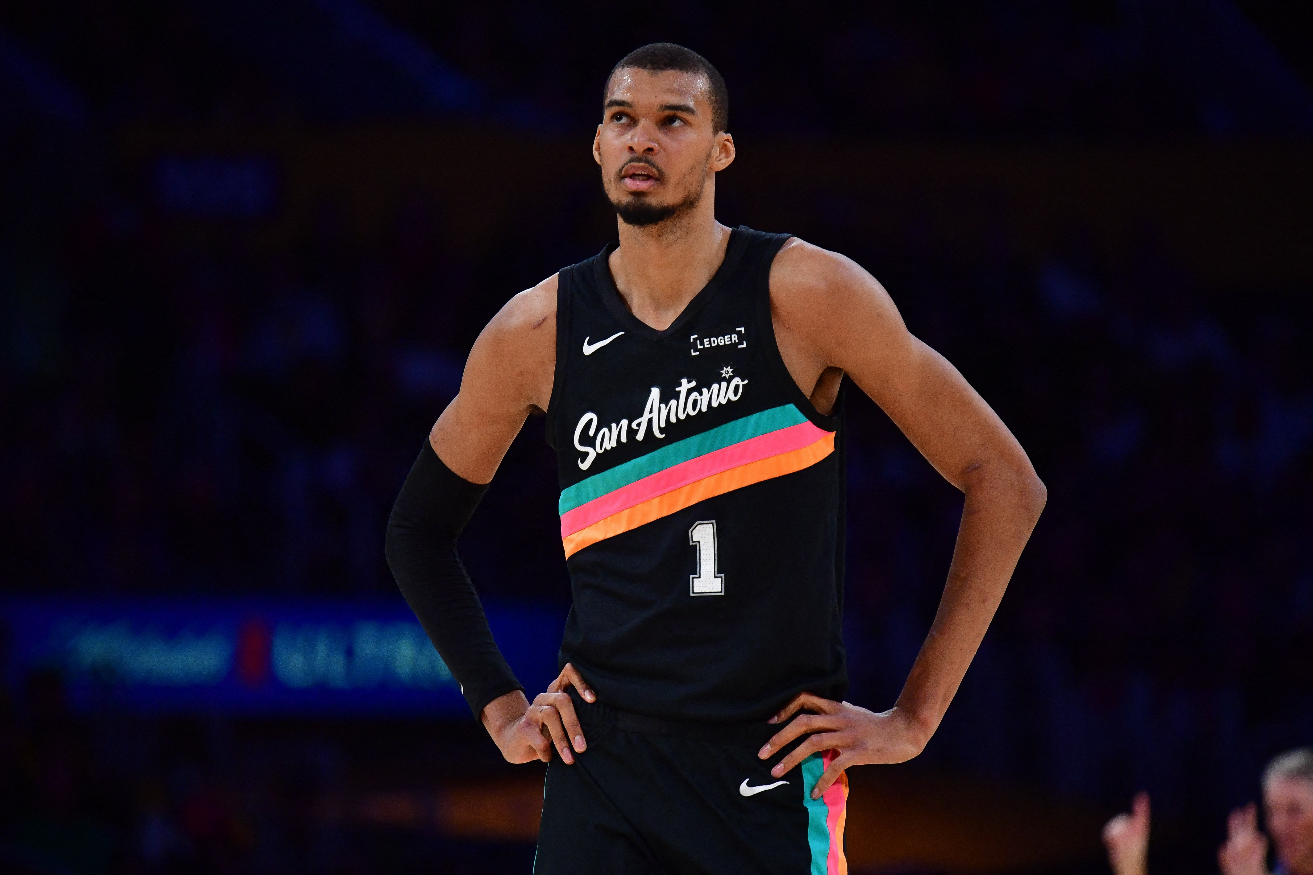 San Antonio Spurs forward Victor Wembanyama (1), seen here reacting, is featured in our Spurs vs. Warriors player props today.