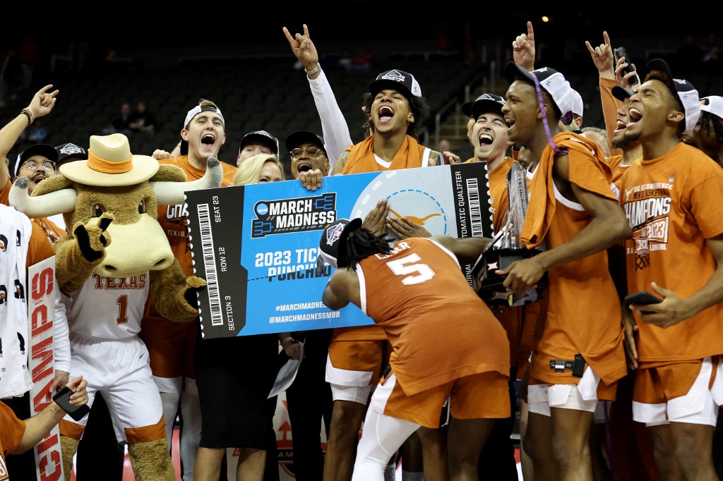 Texas Longhorns celebrate after defeating the Kansas Jayhawks as we look at the Final Four odds.