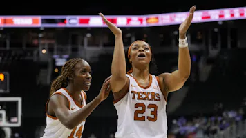 Aaliyah Moore #23 and Amina Muhammad #14 of the Texas Longhorns as we make our Gonzaga vs. Texas prediction and pick for the Sweet 16 of the NCAA Tournament on Friday.