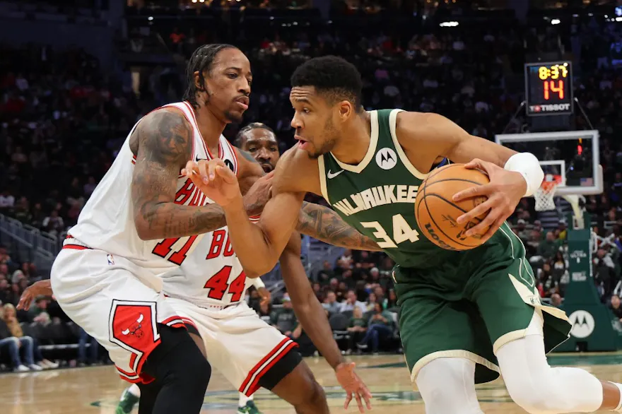 Giannis Antetokounmpo #34 of the Milwaukee Bucks drives to the basket against DeMar DeRozan #11 of the Chicago Bulls as we make our Bucks vs. Bulls NBA player props predictions and picks for Friday.