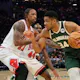 Giannis Antetokounmpo #34 of the Milwaukee Bucks drives to the basket against DeMar DeRozan #11 of the Chicago Bulls as we make our Bucks vs. Bulls NBA player props predictions and picks for Friday.