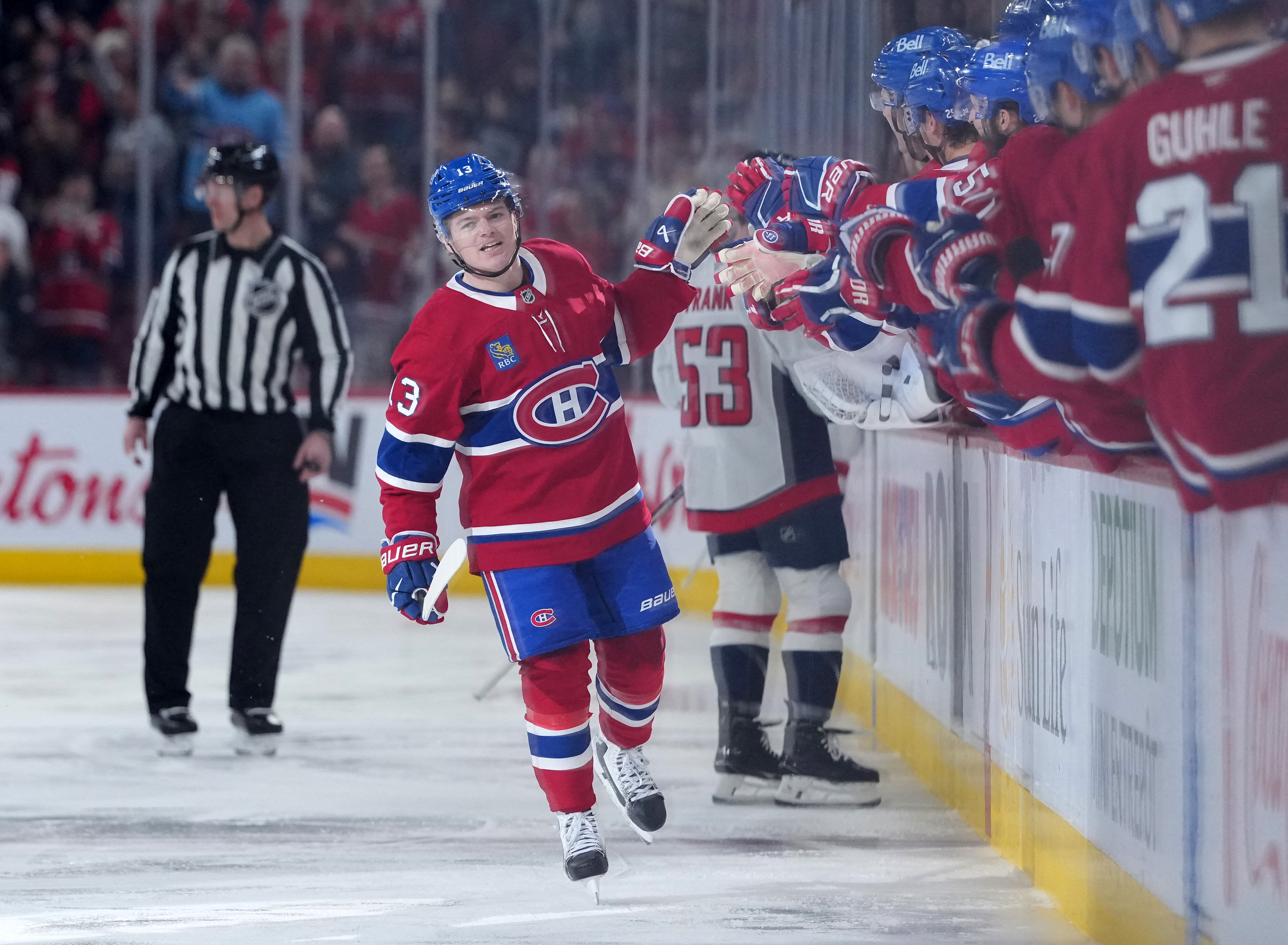 Cole Caufield after scoring a goal as we provide our Canadiens vs. Senators prediction and odds. 